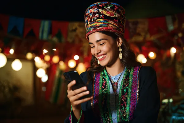 A confident dealer surrounded by casino chips inviting players to access their TTTJILI account, reflecting quick and easy login options.